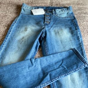 Skinny high waisted light blue button fly jegging